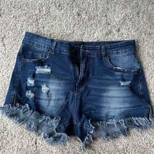 Distressed denim shorts